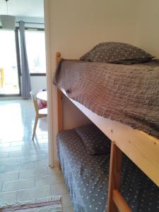 Ένα ή περισσότερα κρεβάτια σε δωμάτιο στο Gréolières les Neiges Studio 4 personnes