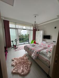 A bed or beds in a room at Çolakoglu konagı