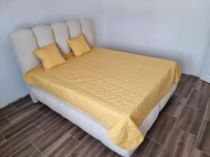 Postel nebo postele na pokoji v ubytování Sekulic Apartman Tara