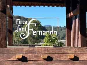 a window with the words finera san francisco generani at Finca San Fernando in Villa del Carbón