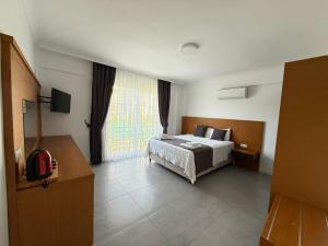 AdaHan Family Rooms Gocek客房内的一张或多张床位