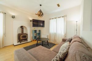 Et tv og/eller underholdning på Casa das Orquideas by Vacationy