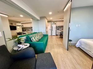 A bed or beds in a room at Flat Hotel à Beira Mar Recife by Direct