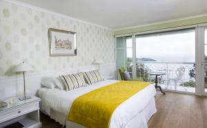 Ein Bett oder Betten in einem Zimmer der Unterkunft Hotel Isla Seca