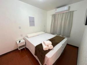 Una cama o camas en una habitación de Anexos De Rose