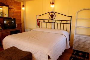 Voodi või voodid majutusasutuse K3 Guest Ranch toas