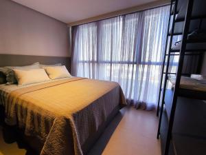 Postel nebo postele na pokoji v ubytování Flats Luxuosos no Way Tambaú