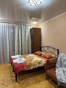 Postel nebo postele na pokoji v ubytování Anamaria's Aparment