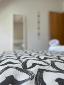 Ein Bett oder Betten in einem Zimmer der Unterkunft HOUSE TUVESA PREMIUM 1 DORMITORIO WIFI GRATiS