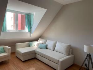 Ein Sitzbereich in der Unterkunft HOUSE TUVESA PREMIUM 1 DORMITORIO WIFI GRATiS