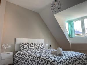 Ein Bett oder Betten in einem Zimmer der Unterkunft HOUSE TUVESA PREMIUM 1 DORMITORIO WIFI GRATiS