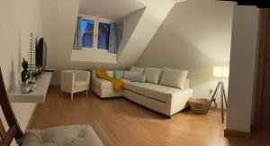 Ein Sitzbereich in der Unterkunft HOUSE TUVESA PREMIUM 1 DORMITORIO WIFI GRATiS