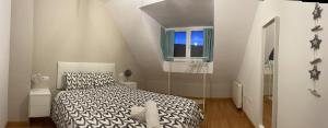 Ein Bett oder Betten in einem Zimmer der Unterkunft HOUSE TUVESA PREMIUM 1 DORMITORIO WIFI GRATiS