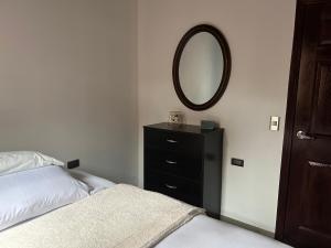 Postel nebo postele na pokoji v ubytování La casa de la H, entre pinos