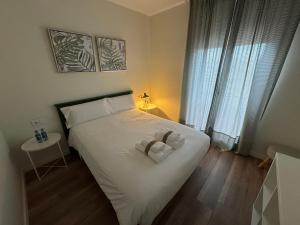 Postel nebo postele na pokoji v ubytování B&Suites Xàtiva