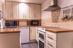 Η κουζίνα ή μικρή κουζίνα στο Lodging In Carrickfergus Centre