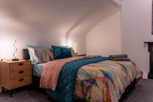 Ένα ή περισσότερα κρεβάτια σε δωμάτιο στο Lodging In Carrickfergus Centre +13 φωτογραφίες