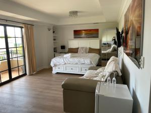 Postel nebo postele na pokoji v ubytování Ganesha Wellness Spa