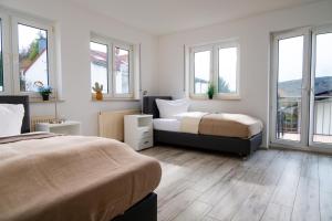 Postel nebo postele na pokoji v ubytování Maisonette 1