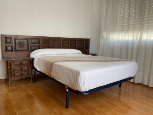 Postel nebo postele na pokoji v ubytování Pasaje Solivar