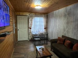 Et tv og/eller underholdning på Cabaña Pangue Hornopirén + 2 billeder