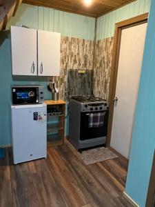 Køkken eller tekøkken på Cabaña Pangue Hornopirén