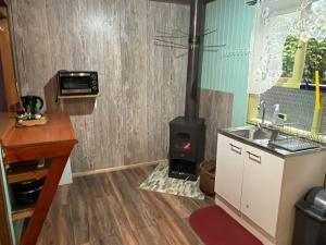 Køkken eller tekøkken på Cabaña Pangue Hornopirén