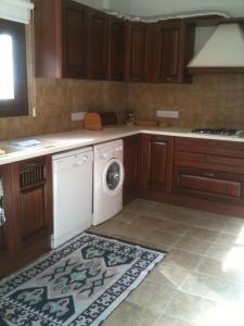 Kuchyň nebo kuchyňský kout v ubytování Galaria House
