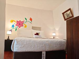 Postelja oz. postelje v sobi nastanitve Afma Cusco