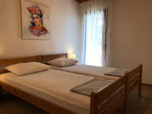 Postel nebo postele na pokoji v ubytování Apartment Petar