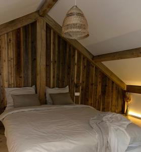 Postel nebo postele na pokoji v ubytování Chalet Hoge Kempen
