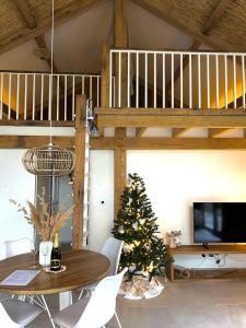 TV a/nebo společenská místnost v ubytování Chalet Hoge Kempen