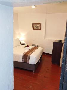 Postelja oz. postelje v sobi nastanitve Afma Cusco