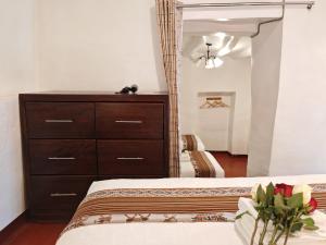 Postelja oz. postelje v sobi nastanitve Afma Cusco