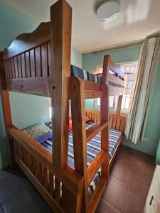 a couple of bunk beds in a room at MF Apartments in Baguio