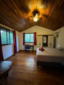 Postel nebo postele na pokoji v ubytování Aura Bungalow