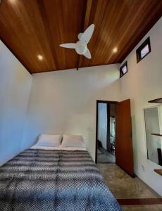 Giường trong phòng chung tại Casa Portaló 1