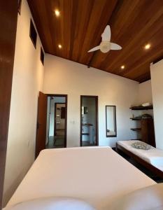 Giường trong phòng chung tại Casa Portaló 1