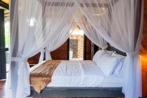 Postel nebo postele na pokoji v ubytování La Sweta 002 + 31 fotografií