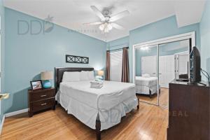 a bedroom with a bed and a television in it at Legacy Tower I 903 in Gulfport +31 photos