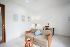 Area soggiorno di Harmony Beach Suite