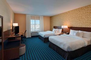 Postel nebo postele na pokoji v ubytování Fairfield Inn & Suites by Marriott Austin Buda
