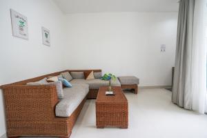 Area soggiorno di Harmony Beach Suite