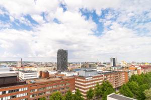 a view of the city from the roof of a building at Courtyard Tampere City in Tampere