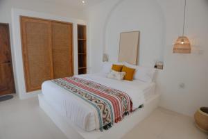 Ένα ή περισσότερα κρεβάτια σε δωμάτιο στο Close to Jimbaran Beach, 3BR with Private Pool +69 φωτογραφίες