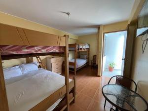 Postel nebo postele na pokoji v ubytování Hospedaje Ola Marina + 37 fotografií