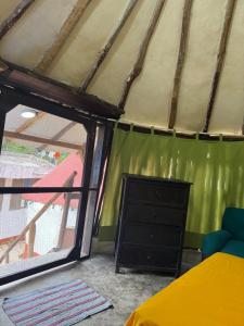 Ένα ή περισσότερα κρεβάτια σε δωμάτιο στο Tree House Tulum