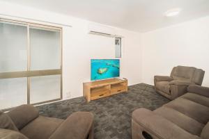 Area soggiorno di Reef Gateway Hotel