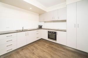 Cucina o angolo cottura di Reef Gateway Hotel