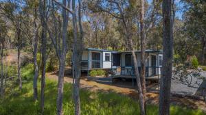 a house in the middle of the woods at BIG4 Bridgetown in Bridgetown